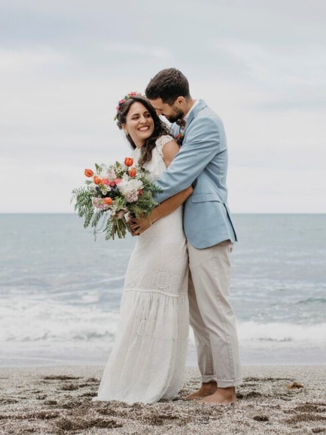 beautiful-husband-wife-posing-beach_23-2149003451