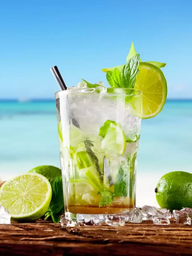bigstock-Mojito-drink-on-wood-with-blur-63752305-1